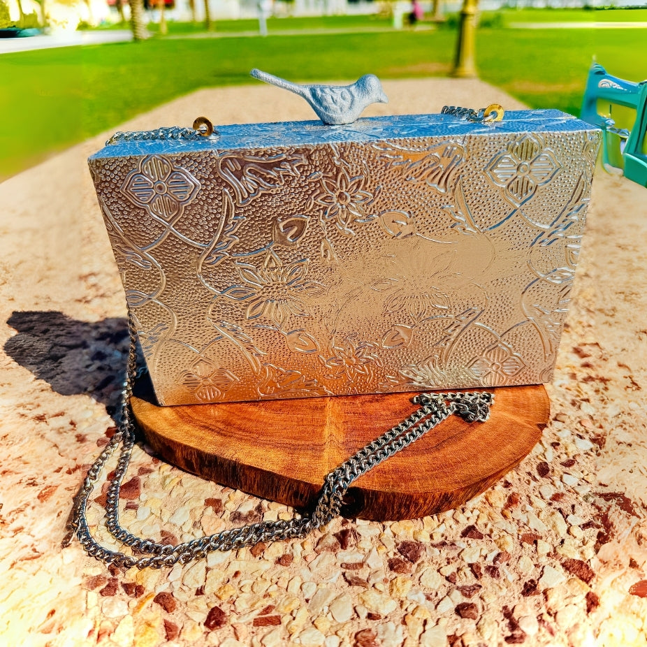 Unique metal handbag made from brass with intricate detailing and durable finish