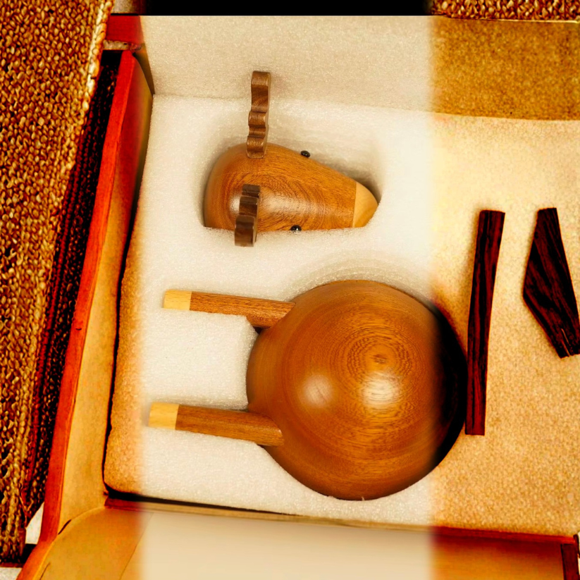 Wooden gourds with handles in a decorative box