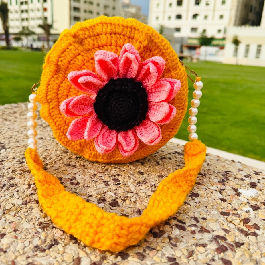 Stylish crochet and pearl handbags in multiple colors adding charm to any outfit