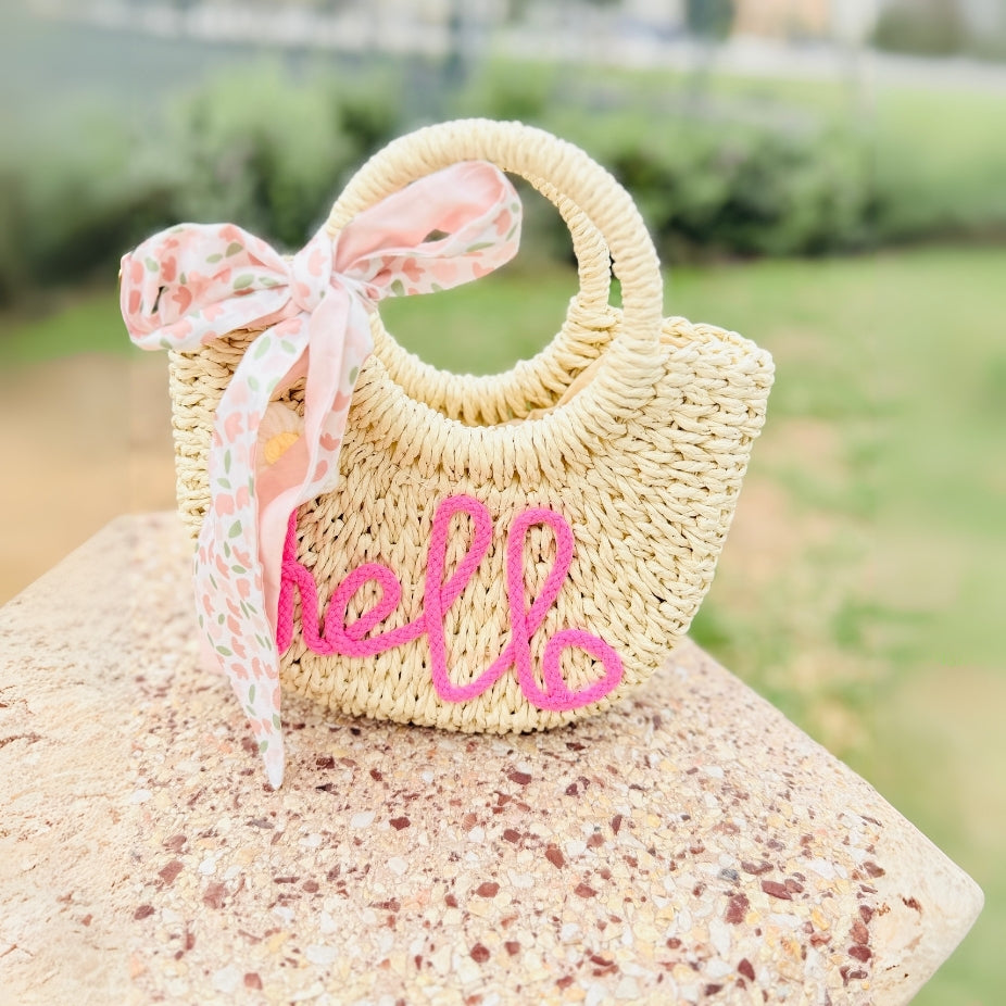 Premium quality straw bag with bow detailing ideal for travel and holiday style