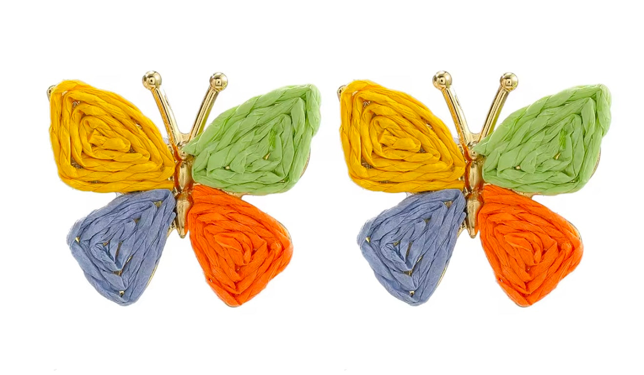 Butterfly-shaped earrings with multicolored wings on a white background