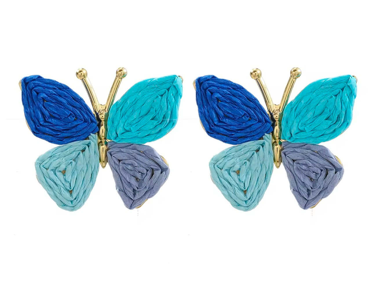 Two butterfly-shaped hair clips in blue and teal with gold accents on a white background.