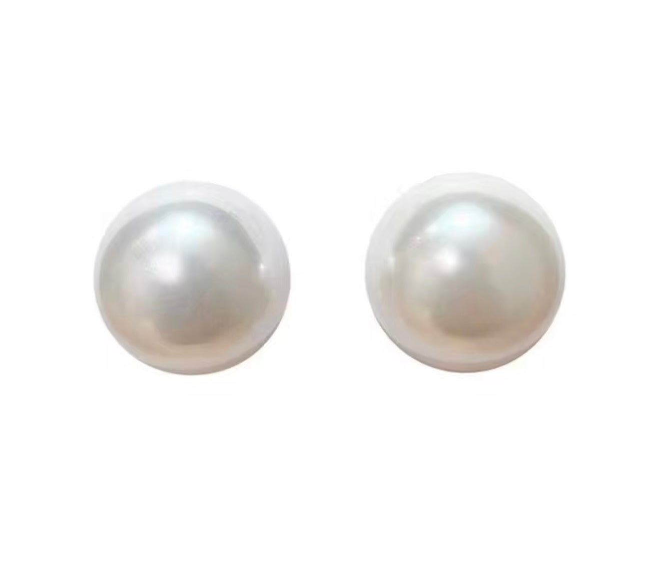 Pair of pearl earrings on a white background
