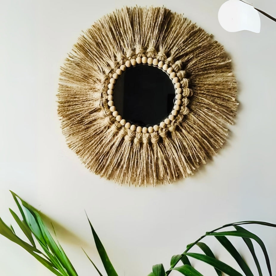 Large decorative wall mirror adding brightness and space to home