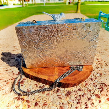 Unique metal handbag made from brass with intricate detailing and durable finish