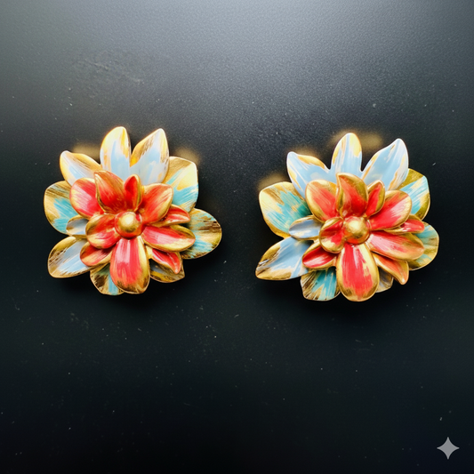 Pair of colorful flower-shaped earrings on a black background