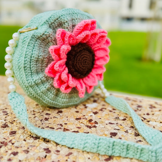 Stylish crochet and pearl handbags in multiple colors adding charm to any outfit