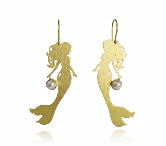 Gold mermaid silhouette earrings with pearl accents on a white background