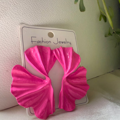 Pink butterfly-shaped earrings on a 'Fashion Jewelry' card with a light background.