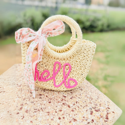 Premium quality straw bag with bow detailing ideal for travel and holiday style